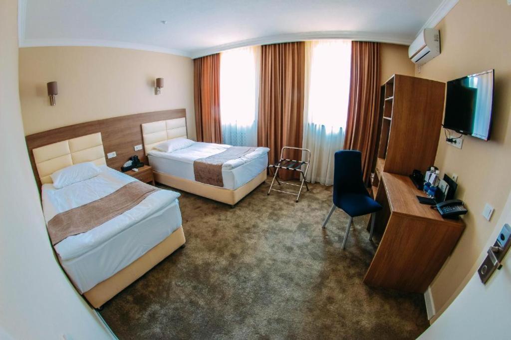 Osh Grand Hotel Chavo ภายนอก รูปภาพ